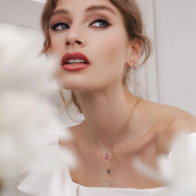 Floral Ruby & Diamond Pendant Necklace in 9ct Yellow Gold
